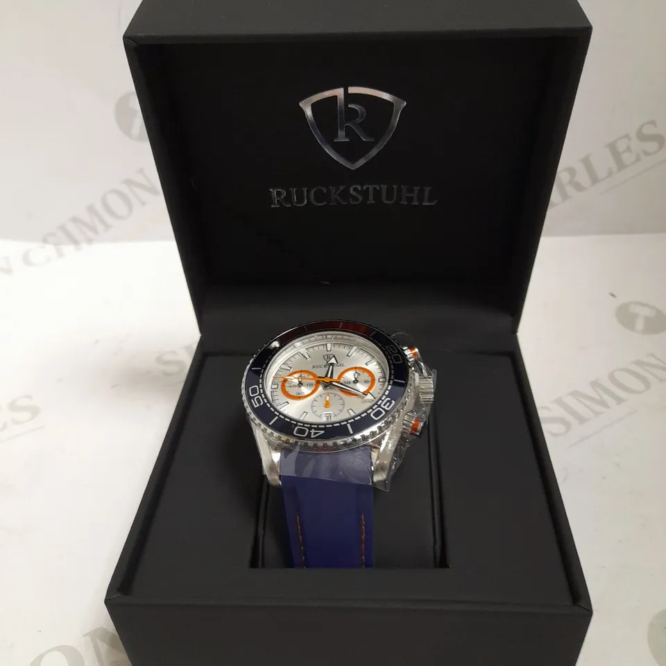 MEN’S RUCKSTUHL CHRONOGRAPH R400 WATCH – SILVER COLOUR CASE – SILVER DIAL – 3ATM WATER RESISTANT – BLUE RUBBER STRAP 