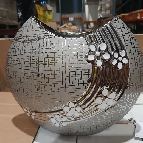 EIGHT DECORATIVE CERAMIC VASE WITH SILVER-TONE GLAZE AND FLORAL RELIEF