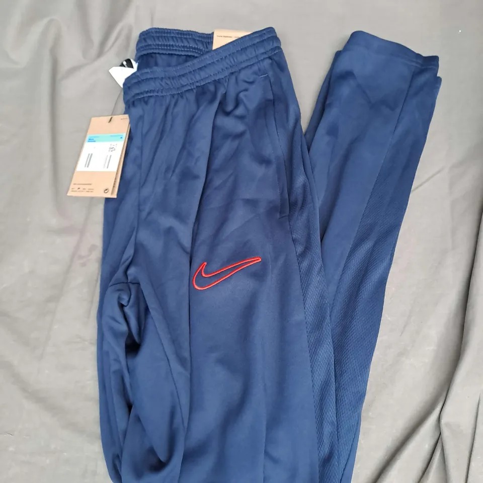 NIKE FOOTBALL TRACK PANTS IN NAVY SIZE M