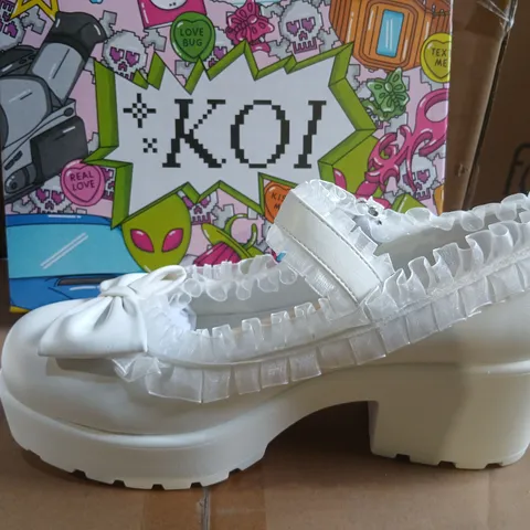BOXED PAIR OF KOI TIRA RUFFLE MARY JANES PORCELAIN DELIGHTS EDITION IN WHITE SIZE UK 10