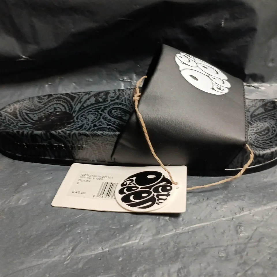 PAIR OF PRETTY GREEN MOCKU SLIDERS IN BLACK SIZE 9