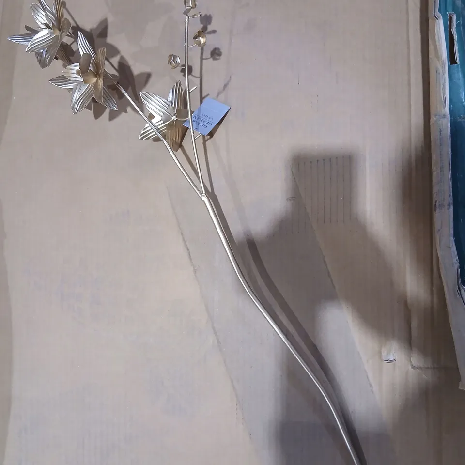 APPROXIMATELY 12 GISELA GRAHAM LONDON GOLD-TONED DECORATIVE METAL BRANCH WITH LEAVES