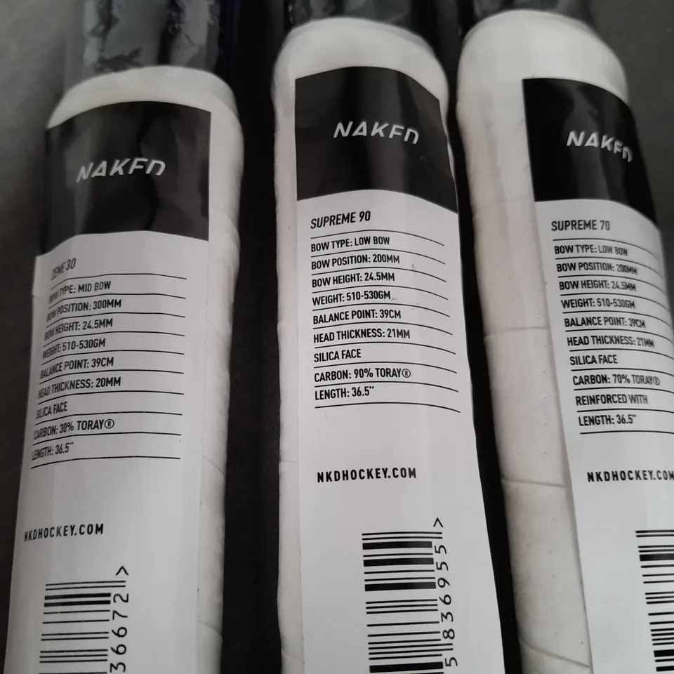 LOT OF 7 ASSORTED BRAND NEW NAKED HOCKEY STICKS