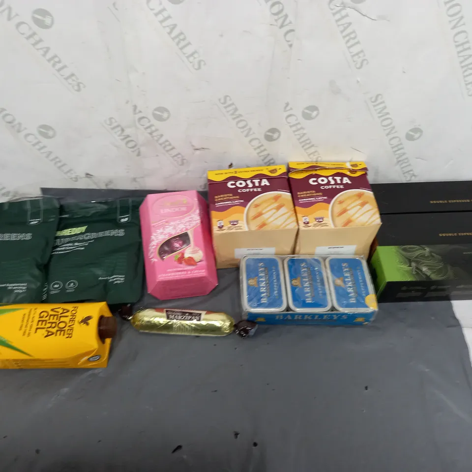 APPROXIMATELY 8 ASSORTED FOOD ITEMS TO INCLUDE - NESPRESSO PODS, SHREDDY SUPERGREENS, AND LINDT STRAWBERRIES AND CREAM ETC. 