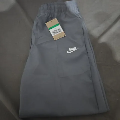 NIKE LOGO TRACKSUIT BOTTOMS - KIDS LARGE