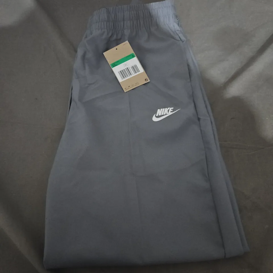 NIKE LOGO TRACKSUIT BOTTOMS - KIDS LARGE