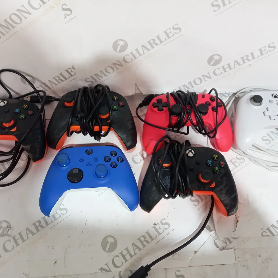 12 BOXED AND UNBOXED CONTROLLERS RANGE OF COLOURS 