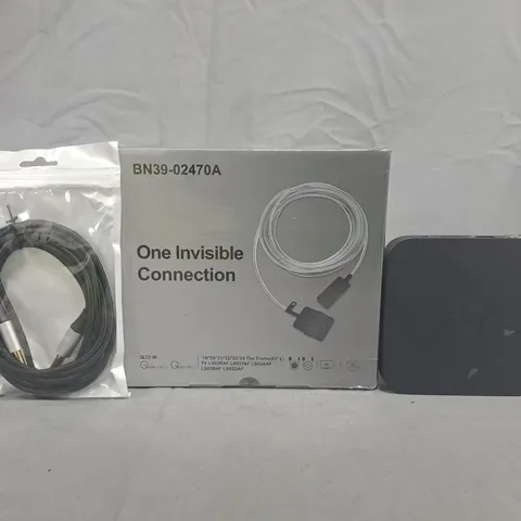 APPROXIMATELY 10 ASSORTED HOUSEHOLD ITEMS TO INCLUDE ONE INVISIBLE CONNECTION, AND VARIOUS CABLES, ETC