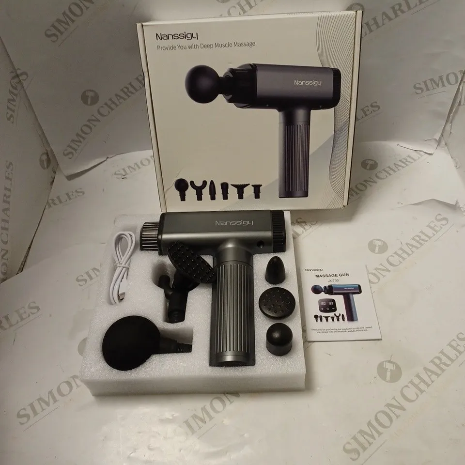 BOXED NANSSIGY DEEP MUSCLE MASSAGE GUN WITH ACCESSORIES AND INSTRUCTION MANUAL