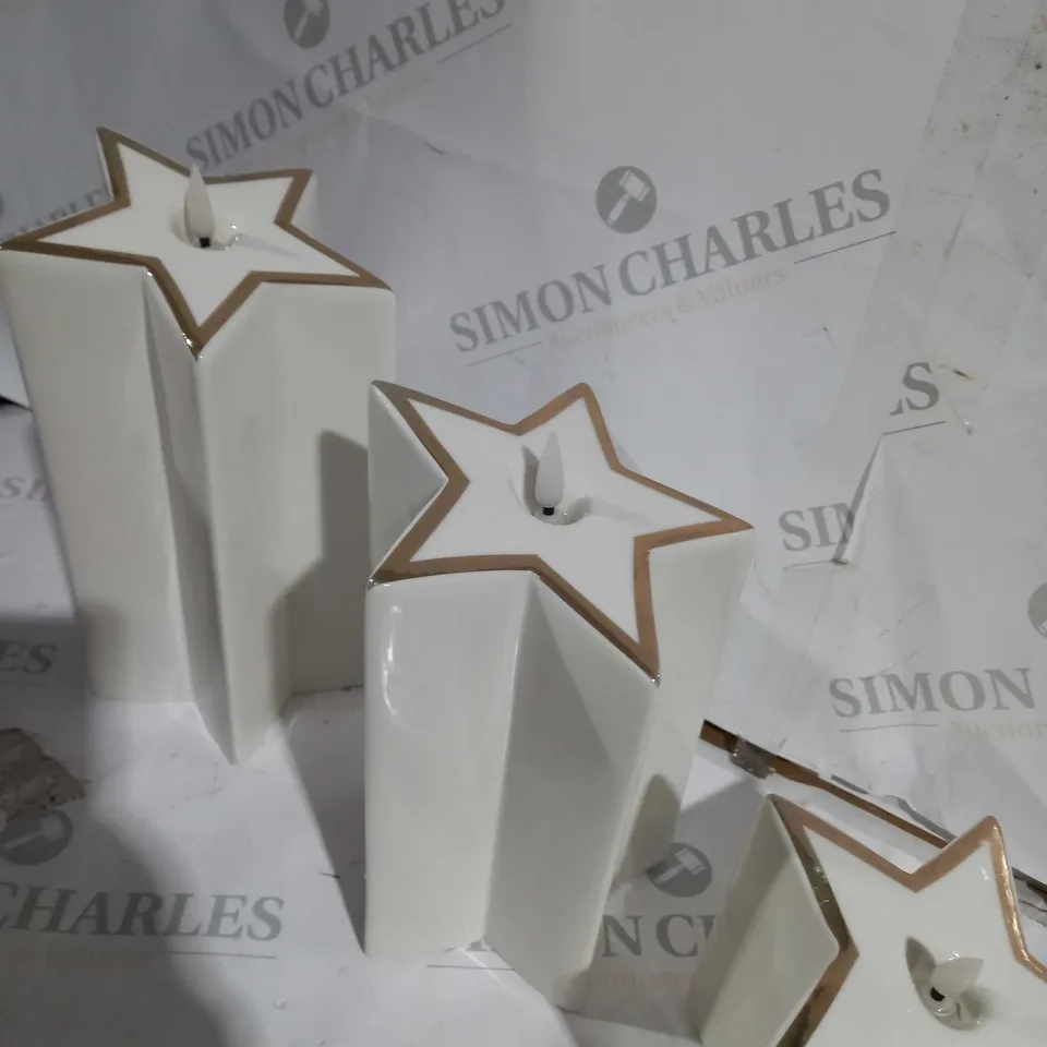 BOXED SET OF 3 PRE-LIT WHITE STAR CANDLES 