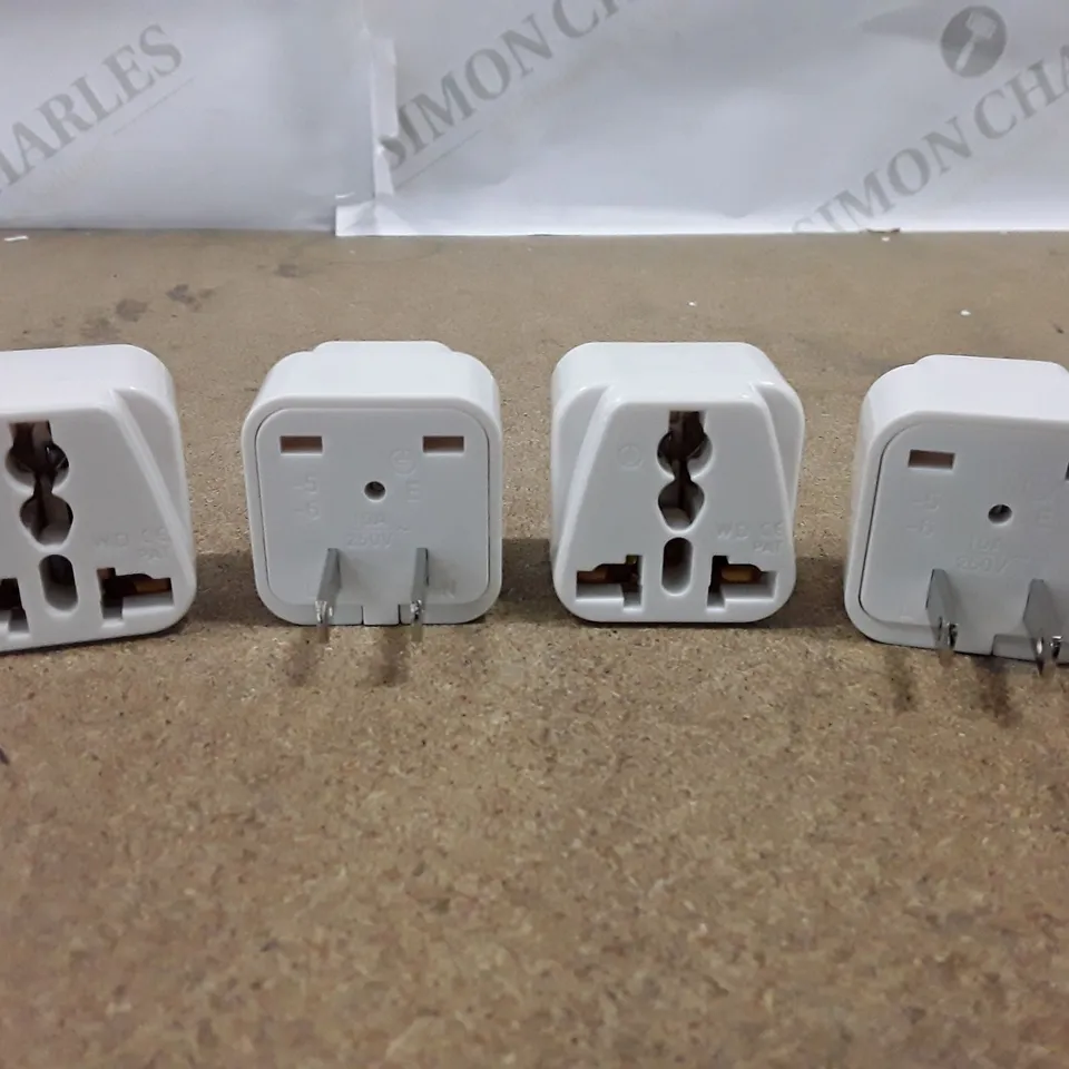 BOX CONTAINING APPROXIMATELY 55 BOXES EACH CONTAINING 4 UK,EU,US TO EU INTERNATIONAL ADAPTERS
