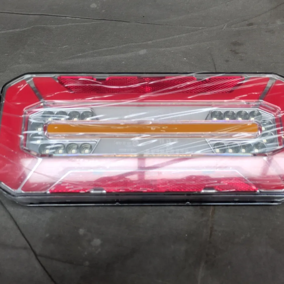 APPROXIMATELY 8 BOXED VTA-05 REAR TAIL LIGHTS 