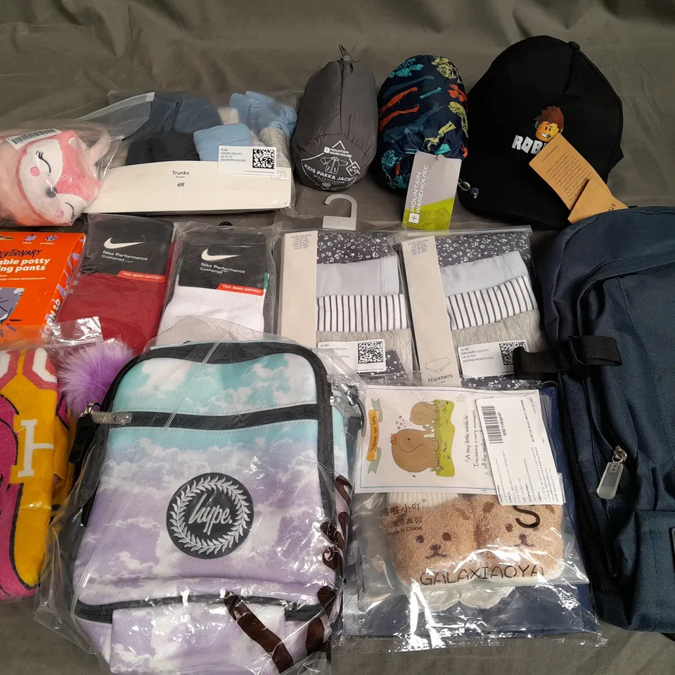 LOT OF ASSORTED CHILDRENS CLOTHING ACCESSORIES TO INCLUDE TRAINING PANTS, HYPE BAG AND MOUNTAIN WAREHOUSE WATERPROOF PARKA