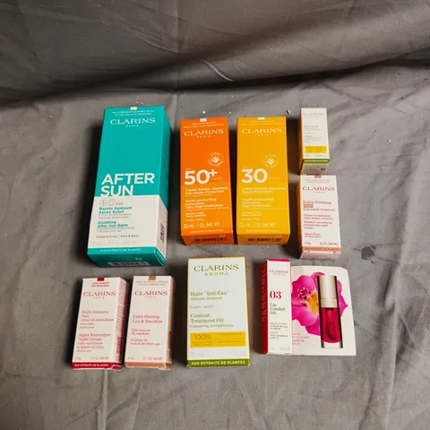CLAIRINS LOT OF 8 ASSORTED SKINCARE PRODUCTS TO INCLUDE - AFTER SUN BALM - SUPER RESTORATIVE NIGHT CREAM - LIP COMFORT OIL - ETC