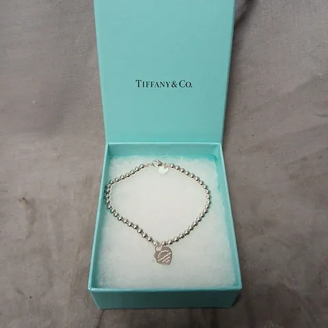 TIFFANY & CO. SILVER BEAD BRACELET WITH HEART CHARM – BOXED