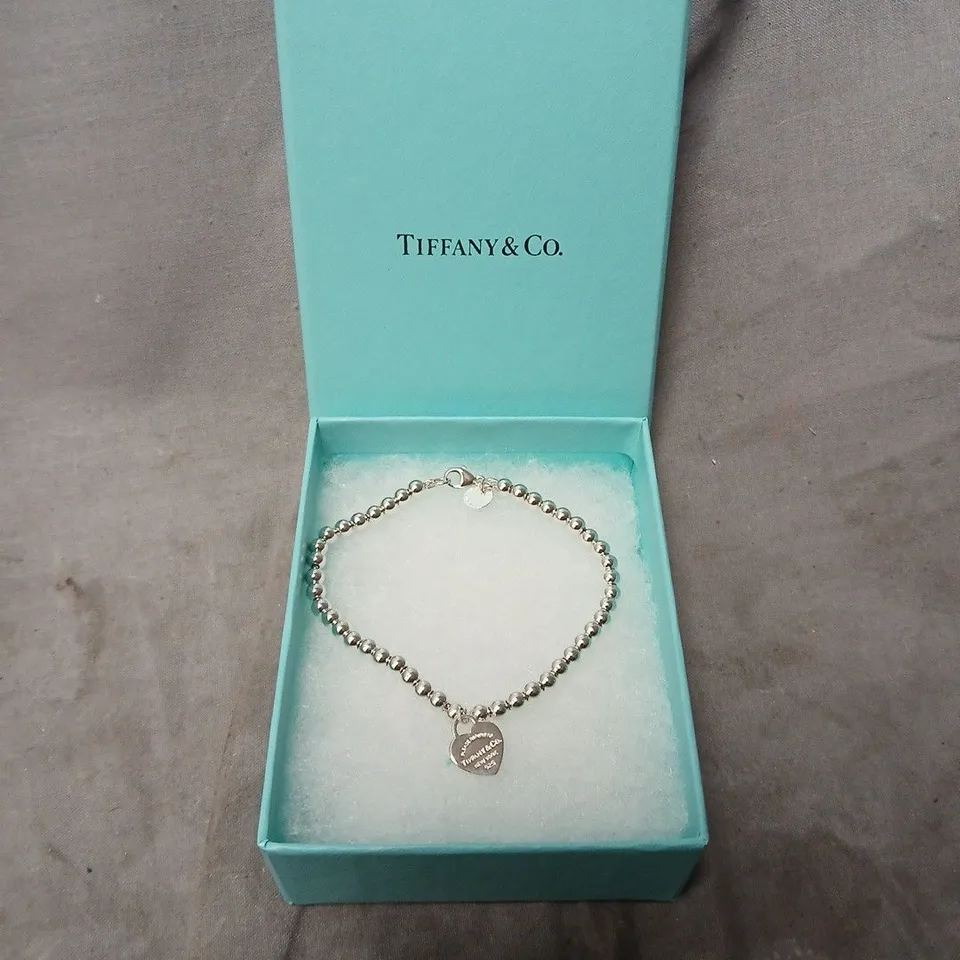 TIFFANY & CO. SILVER BEAD BRACELET WITH HEART CHARM – BOXED