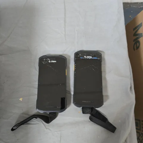 ZEBRA HANDHELD BARCODE SCANNERS (2) NO BATTERIES CRACKED SCREENS