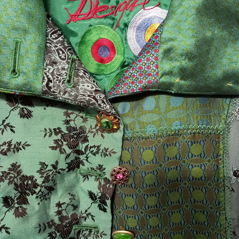 BUTTON THROUGH GREEN PATTERENED COAT - SIZE UNSPECIFIED