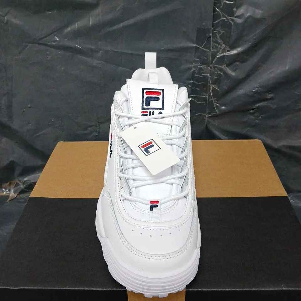BOXED PAIR OF FILA DISRUPTOR PREMIUM TRAINERS IN WHITE - UK SIZE 9