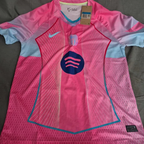 NIKE FC BARCELONA PINK SPOTIFY DRI-FIT FOOTBALL SHIRT – MEN’S SIZE M