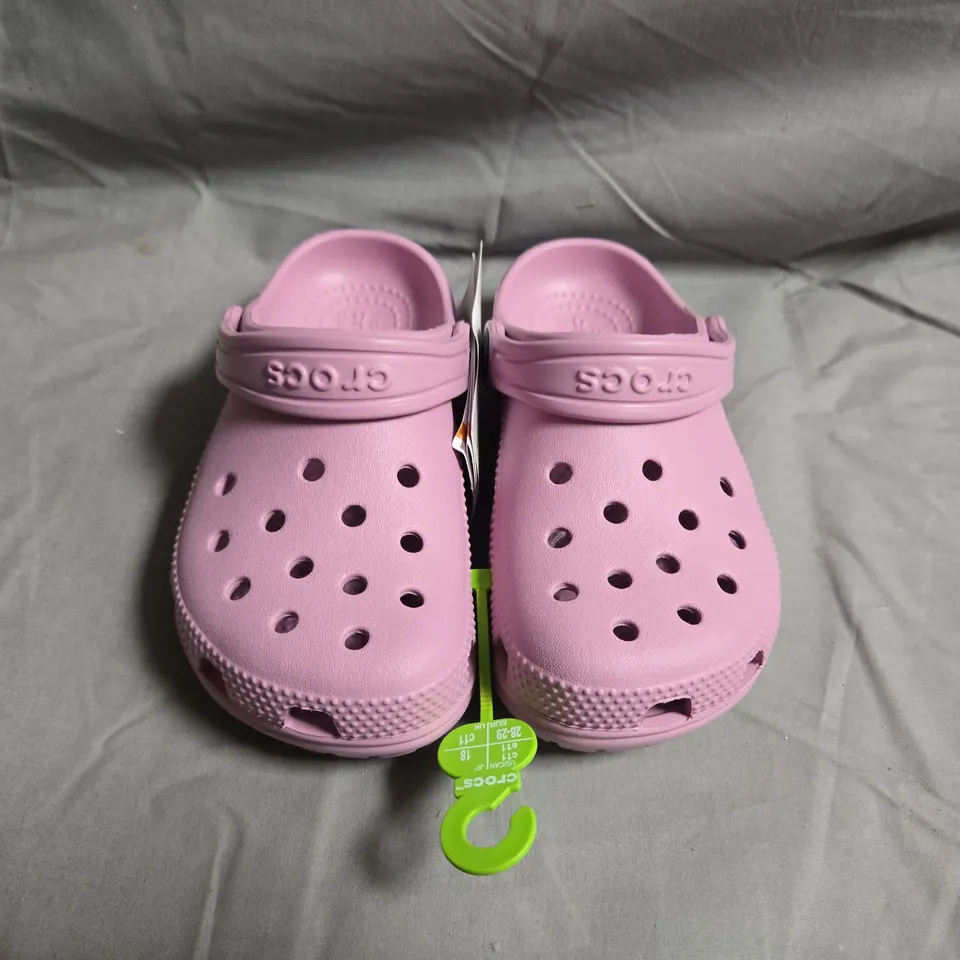 PAIR OF CROCS KIDS' PINK CLOGS WITH BACK STRAP – UK SIZE C11