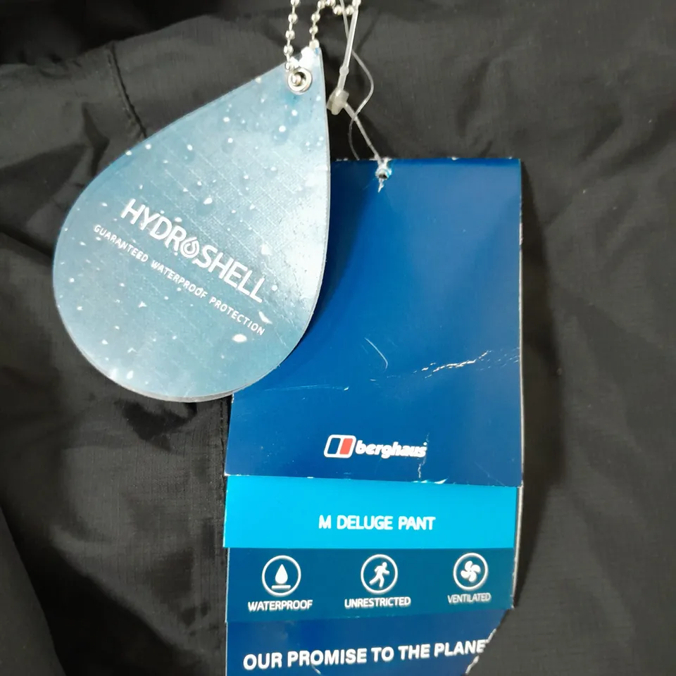 BERGHAUS DELUGE OVERTROUSERS IN BLACK SIZE M 