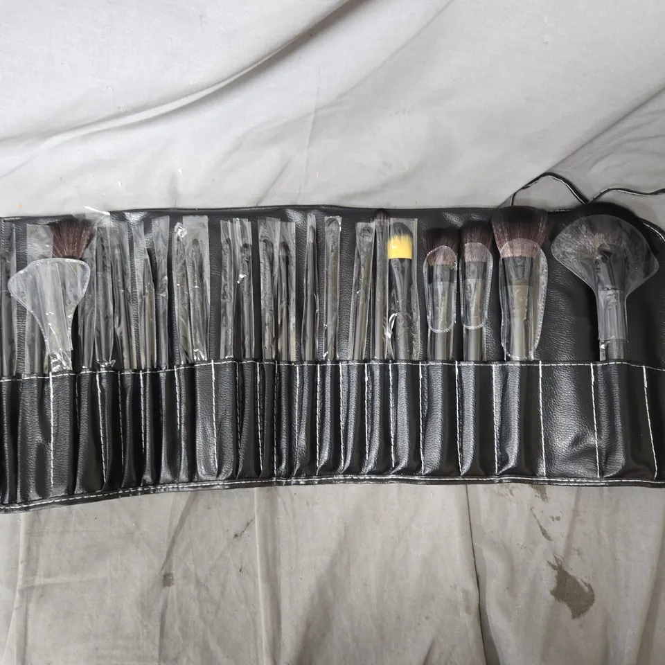 MAKEUP BRUSH SET IN BLACK LEATHER ROLL CASE, BOX OF APPROXIMATELY 10