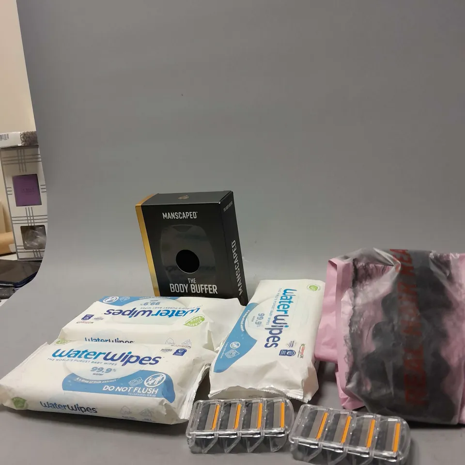 APPROXIMATELY 12 ASSORTED COSMETICS AND BEAUTY ITEMS TO INCLUDE WATER WIPES , BODY BUFFER SYNTHETIC HAIR , ETC 