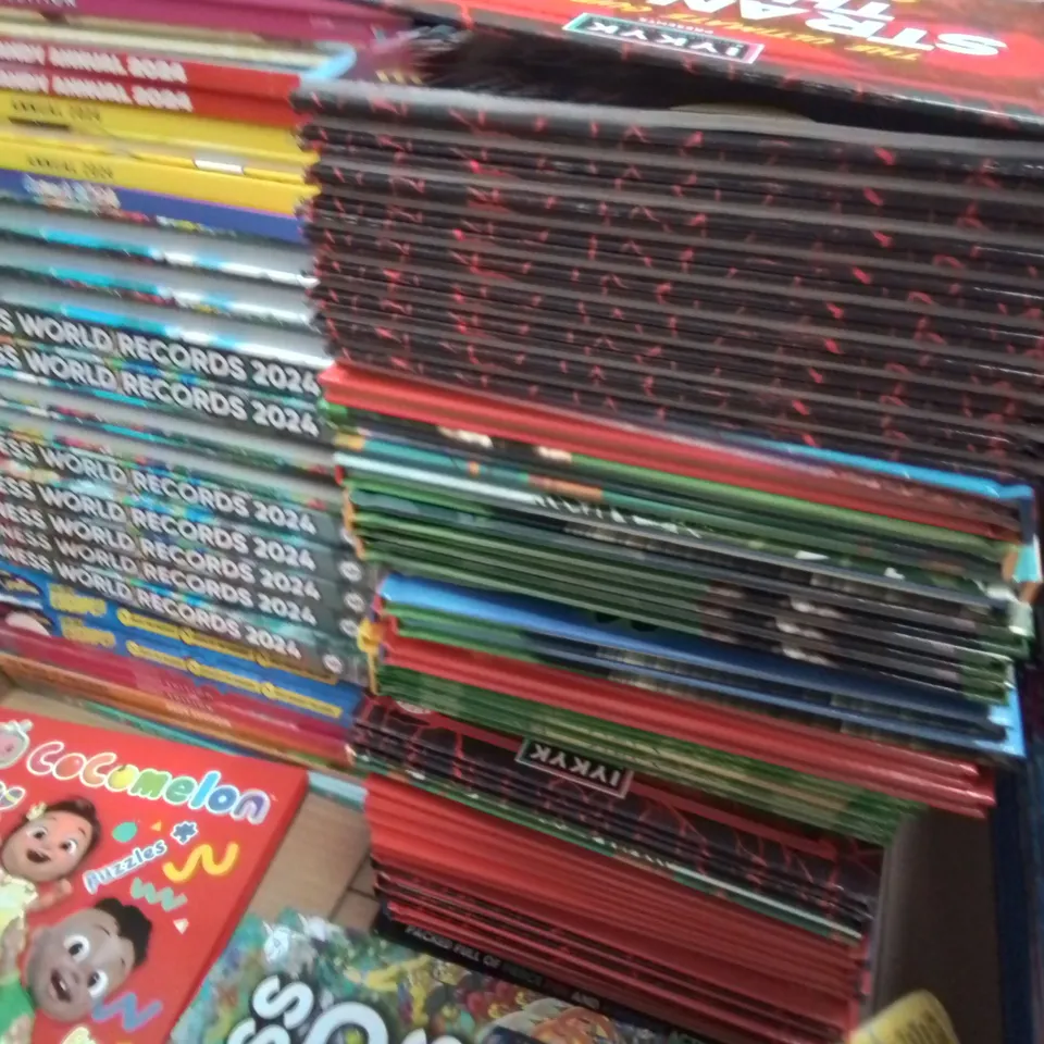 LARGE QUANTITY OF ASSORTED 2024 ANNUALS TO INCLUDE LOL SURPRISE, GUINESS RECORDS, DISNEY PRINCESS AND COCOMELON