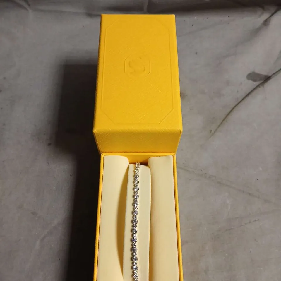 SWAROVSKI DIAMOND TENNIS BRACELET IN WHITE METAL – BOXED