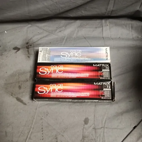 BOX OF APPROXIMATELY 65 HAIR CARE PRODUCTS INCLUDING MATRIX COLOR SYNC MAGENTA/VIOLET/BRUNETTE