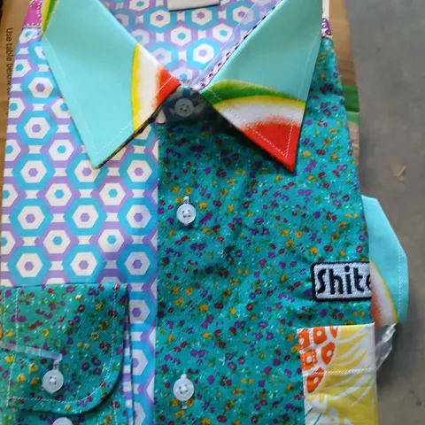APPROXIMATELY SEVEN ASSORTED SHITE SHIRTS