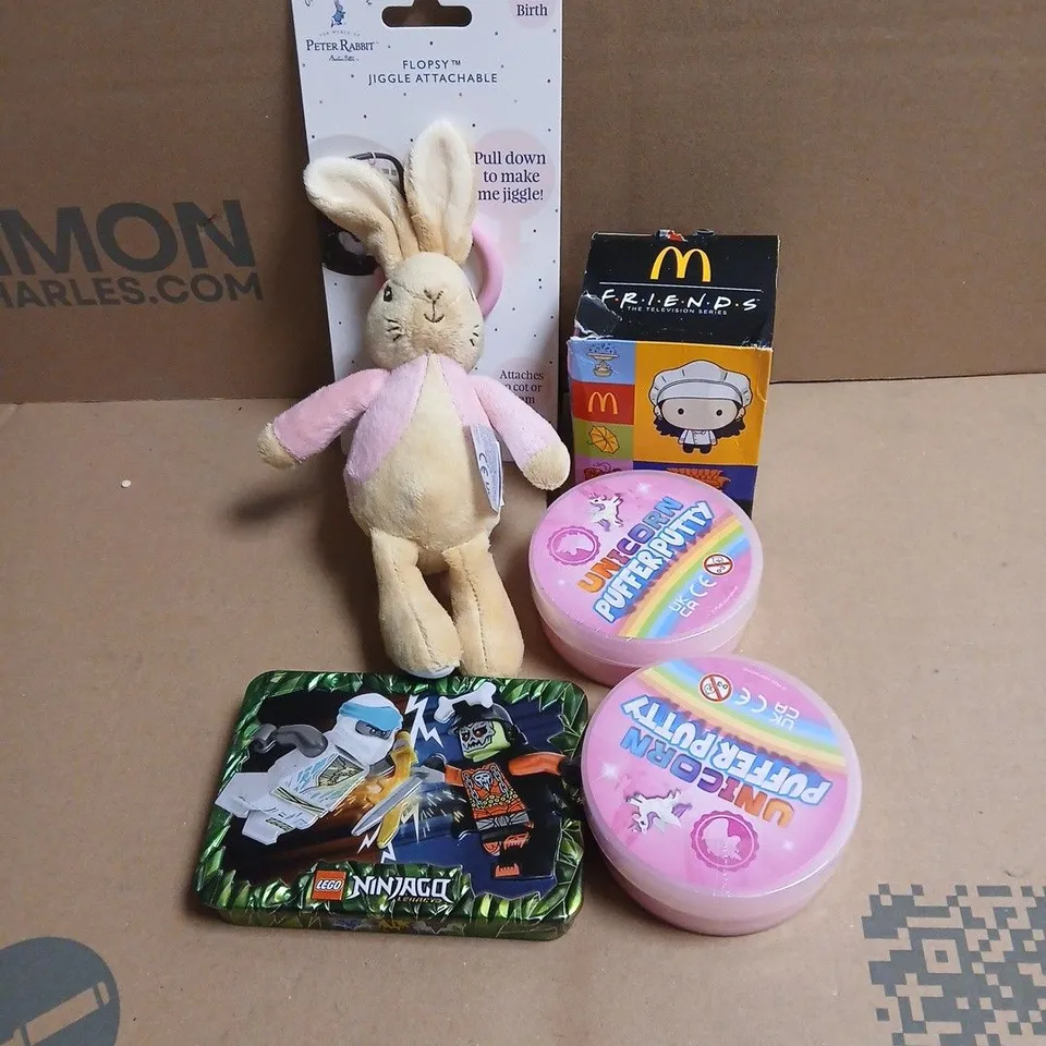 TOTE OF APPROXIMATELY 20 ASSORTED TOYS/RELATED ITEMS TO INCLUDE PETER RABBIT FLOPSY, MCDONALDS FRIENDS TOY, UNICORN PUTTY, LEGO NINJAGO ETC