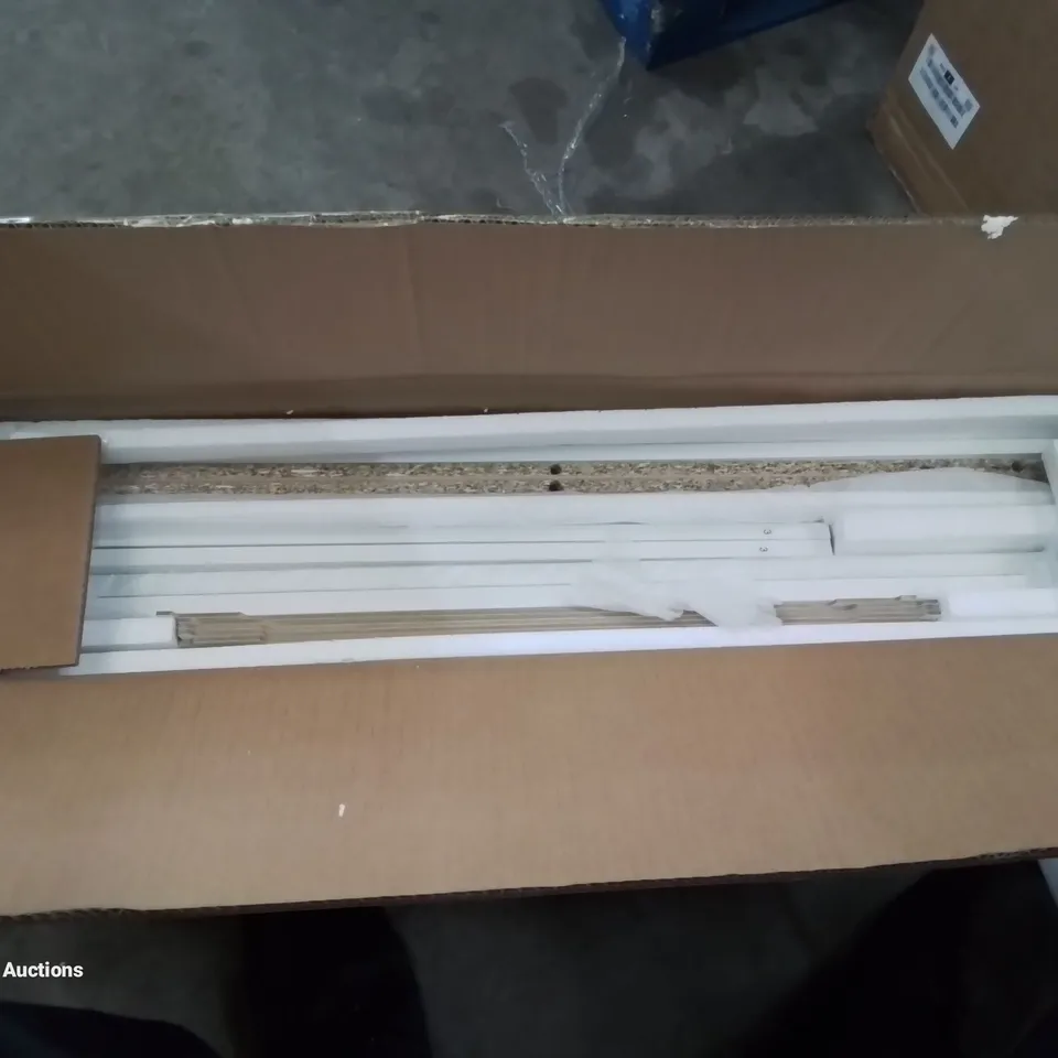A BOXED WHITE WOODEN RADIATOR COVER