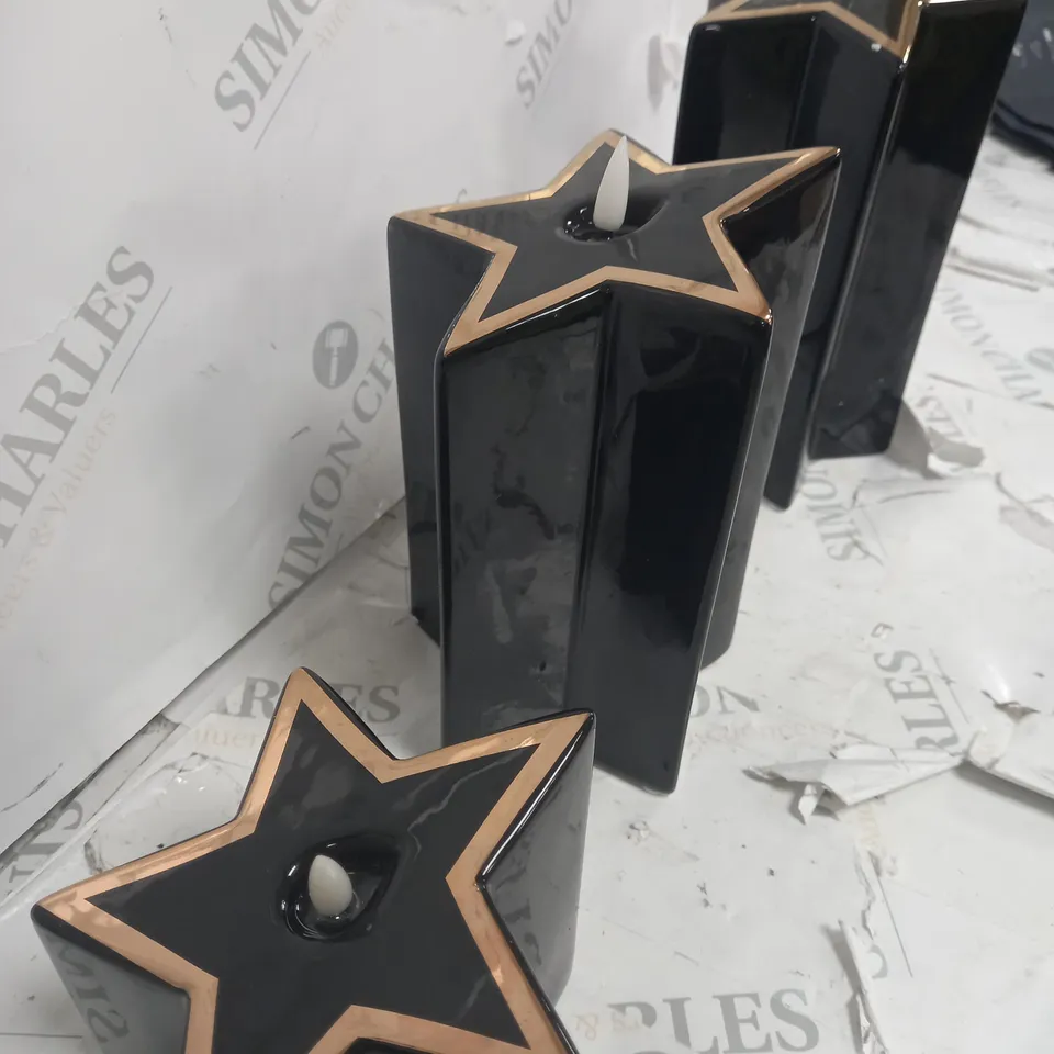 HOME REFLECTIONS CERAMIC STAR PRE-LIT CANDLES