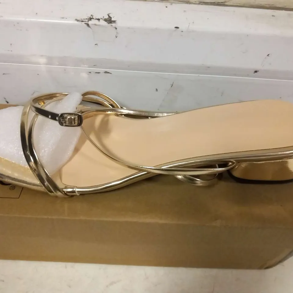 BOXED GOLD STRAP SHOES SIZE EU 42