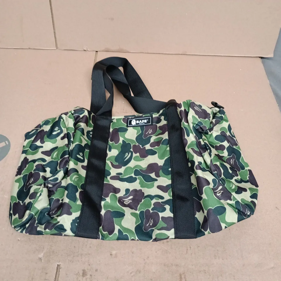 A BATHING APE (BAPE) CAMOUFLAGE DUFFEL BAG