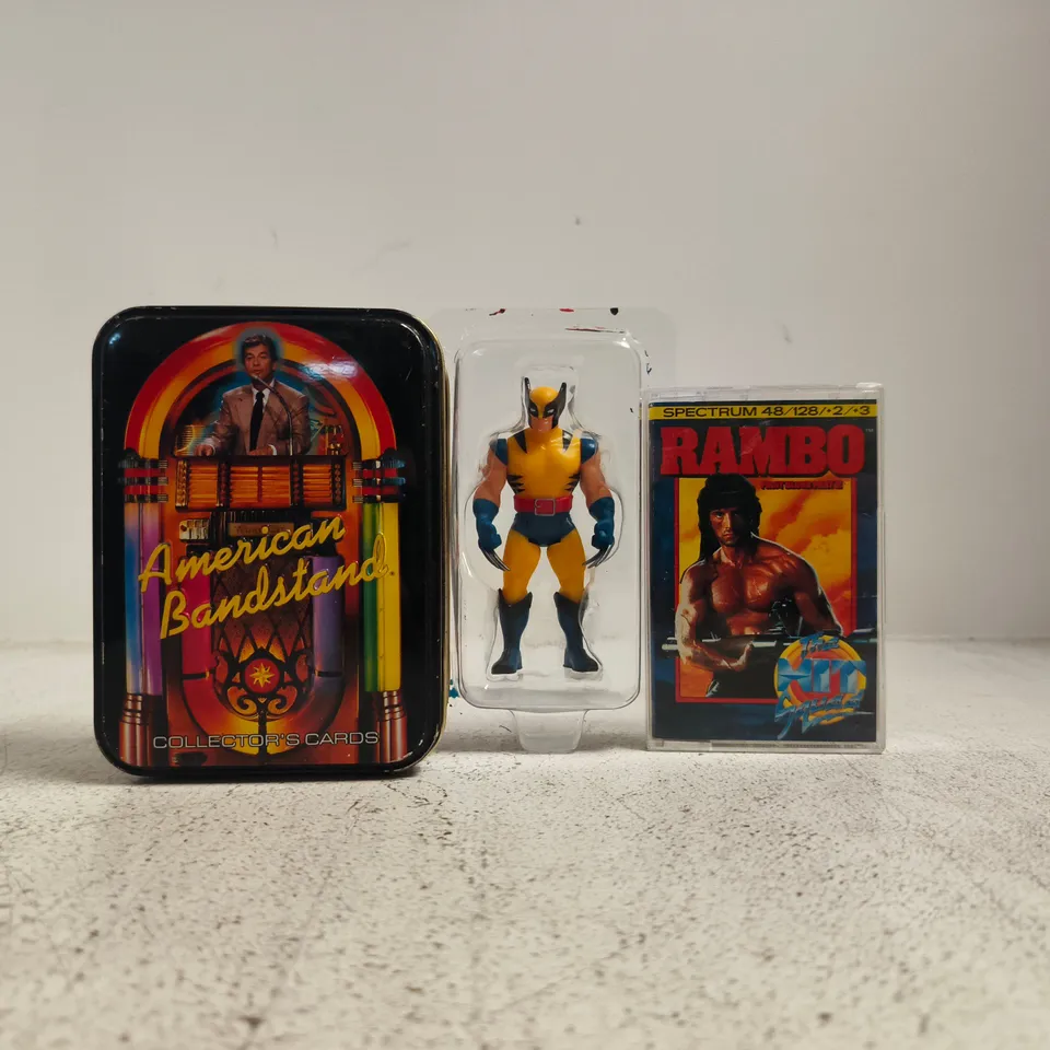 APPROXIMATELY 10 ASSORTED TOYS AND GAMES TO INCLUDE RAMBO SPECTRUM GAME, ETC