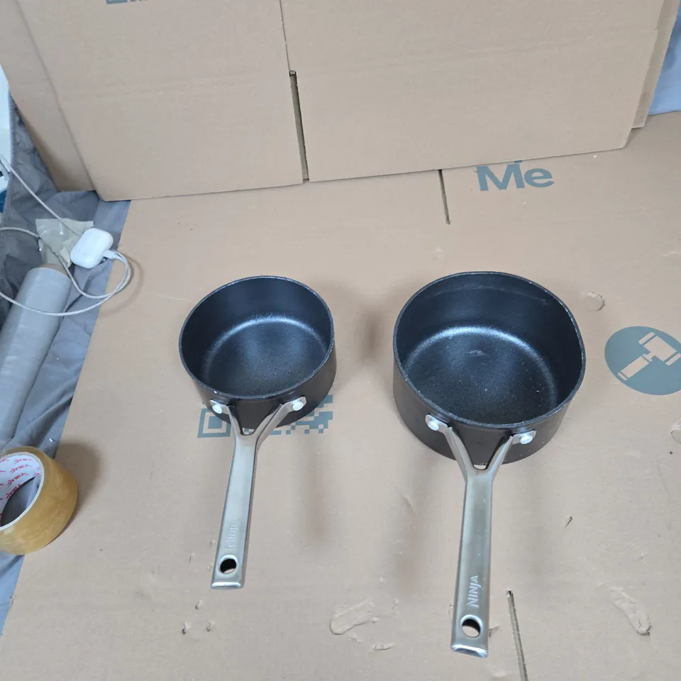 CAGE OF APPROXIMATELY 9 ASSORTED ITEMS TO INCLUDE: NINJA SAUCEPAN