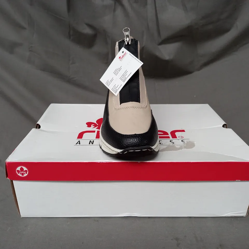BOXED PAIR OF RIEKER HI TOP TRAINERS IN BEIGE SIZE 5