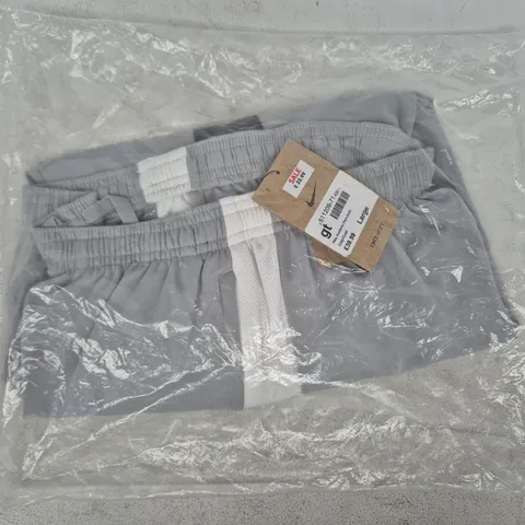 BAGGED NIKE ACADEMY PANTS IN GREY/GOLD SIZE LARGE