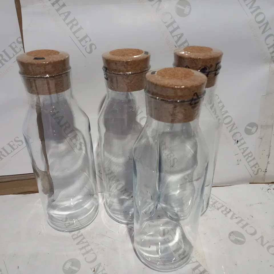 DESIGNER SET OF GLASS STORAGE JARS
