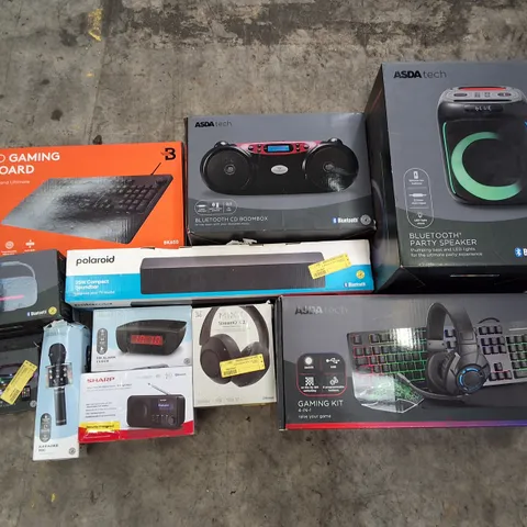 PALLET CONTAINING ASSORTED ELECTRICAL RETURNS INCLUDING GAMING KIT, BLUETOOTH CD BOOMBOX, 25W COMPACT SOUNDBAR, KARAOKE MIC, HEADPHONES & FM ALARM CLOCK