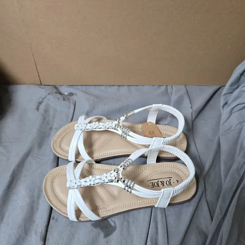 WHITE STRAPPY SANDALS WITH CRYSTAL FLOWER EMBELLISHMENTS – UK 4 BY JO AND JOE .