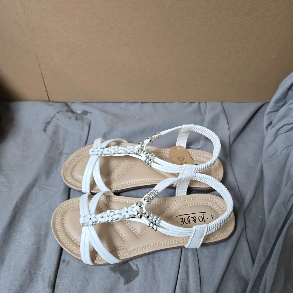 WHITE STRAPPY SANDALS WITH CRYSTAL FLOWER EMBELLISHMENTS – UK 4 BY JO AND JOE .