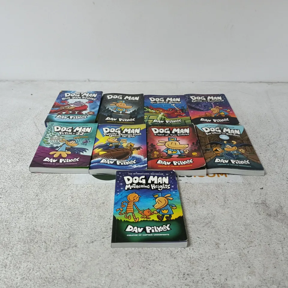 SET OF 9 ASSORTED DOG MAN BOOKS