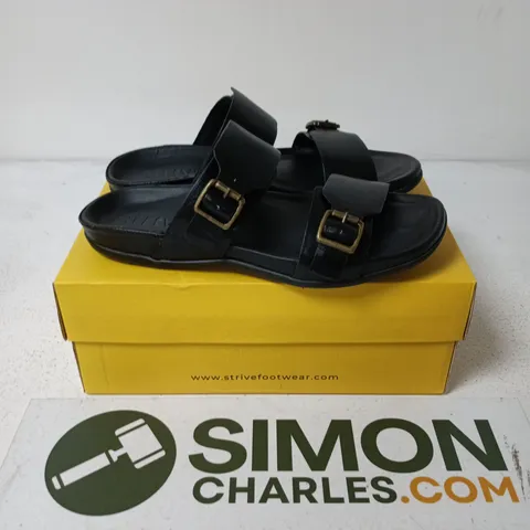 BOXED PAIR OF STRIVE CAPRERA ALL BLACK SANDALS - UK 7