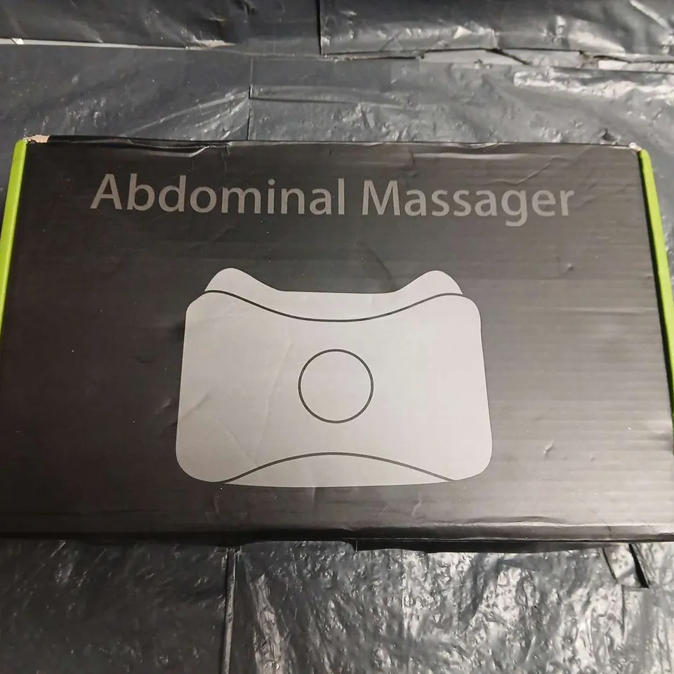 ABDOMINAL MASSAGER - WHITE HANDHELD DEVICE WITH USB CHARGING CABLE 