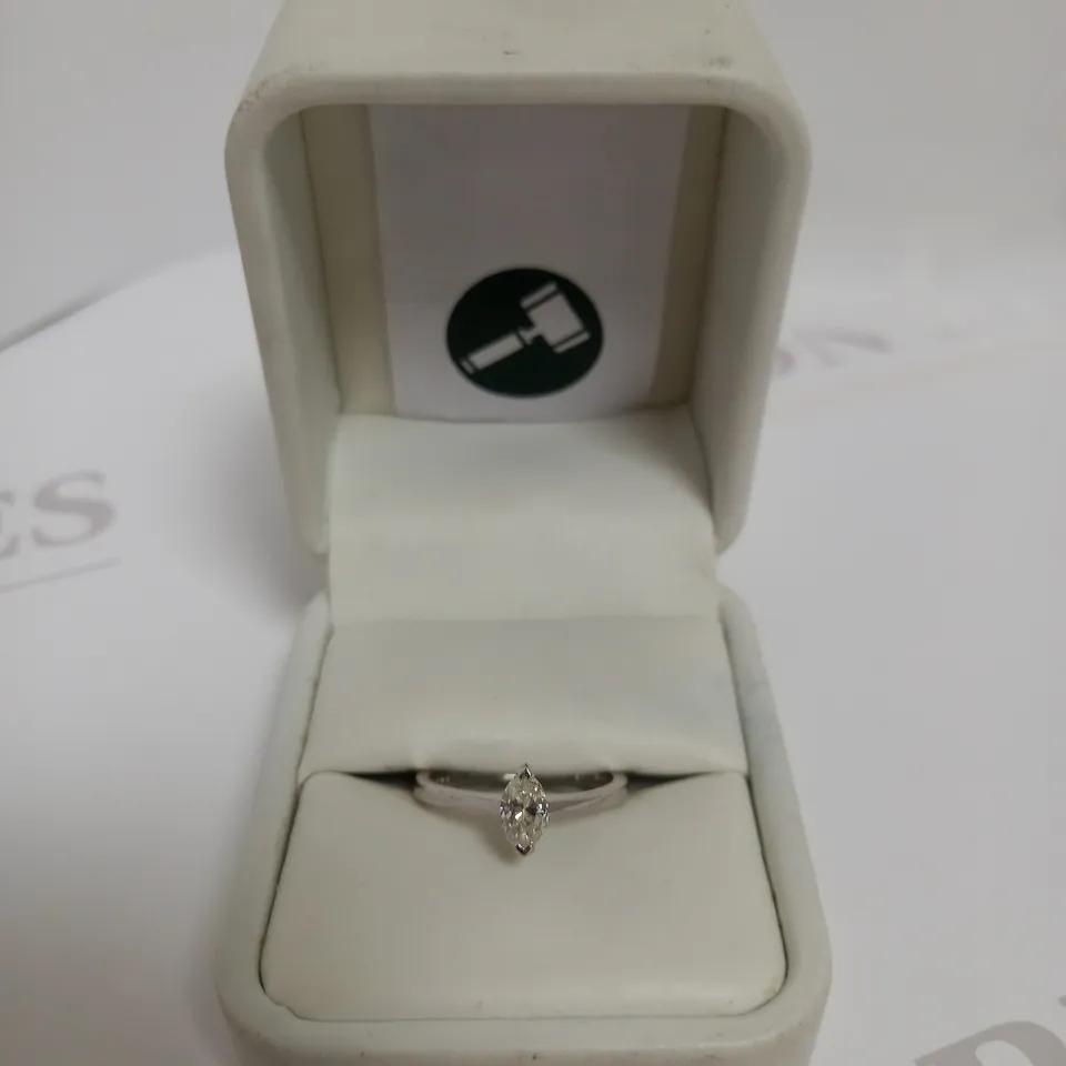 DESIGNER 18CT WHITE GOLD SOLITAIRE RING SET WITH A MARQUISE CUT DIAMOND