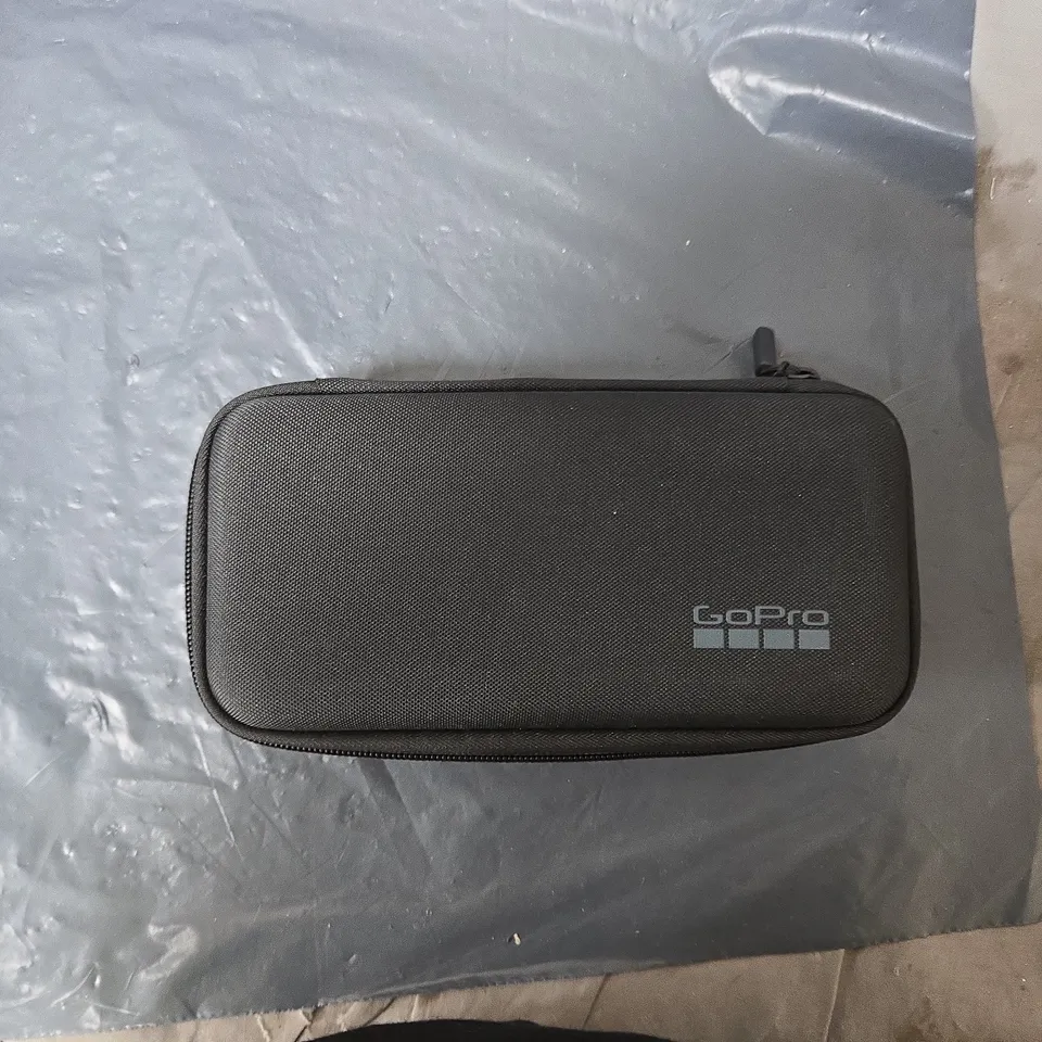 GOPRO ACTION CAMERA WITH ACCESSORY BUNDLE IN CARRY CASE